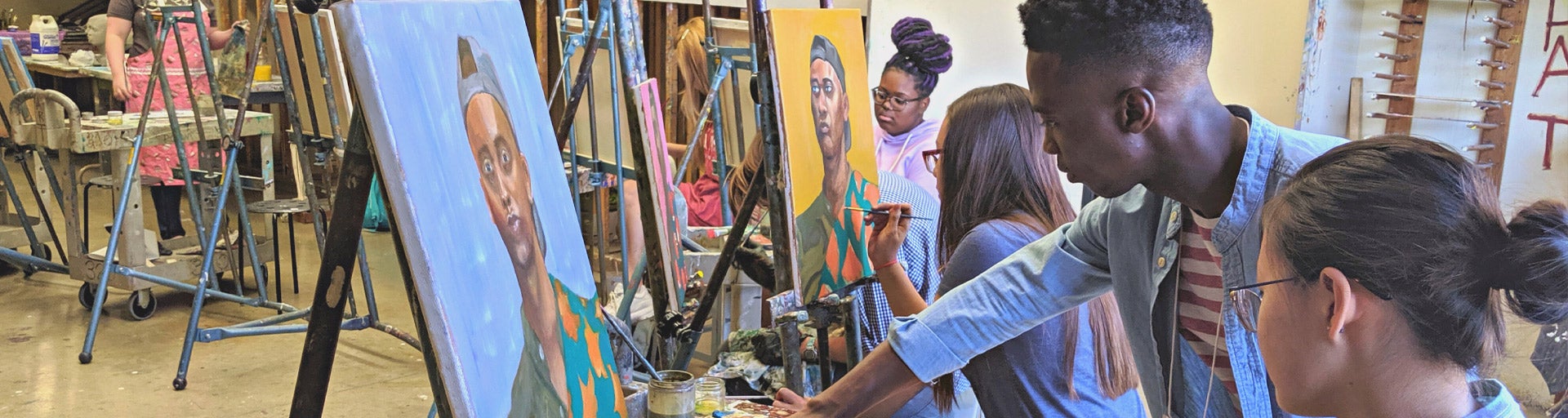 students painting at summer art camp